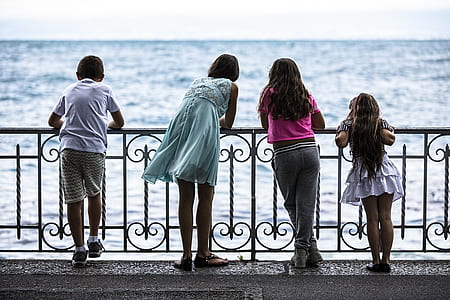 four children's on railings thumbnail