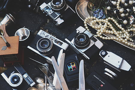 selective focus photography of film cameras thumbnail