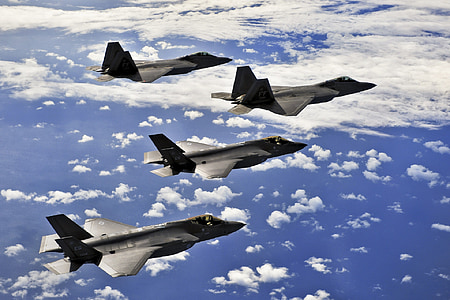 four black jet flying on sky thumbnail