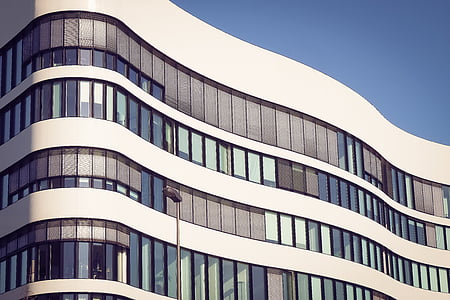 white paint building at daytime thumbnail