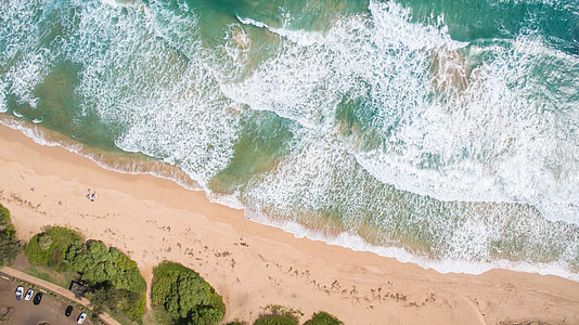 aerial view photography of shore and ocean thumbnail