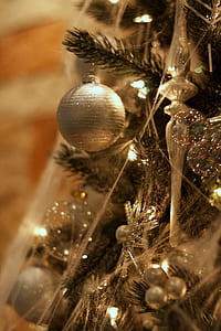 Christmas tree with baubles and lighted string lights thumbnail