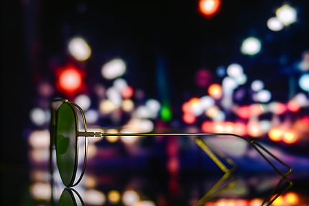 shallow focus photo of green sunglasses with gold frames thumbnail