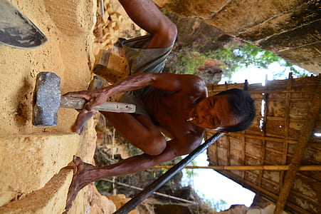 man holding mallet thumbnail