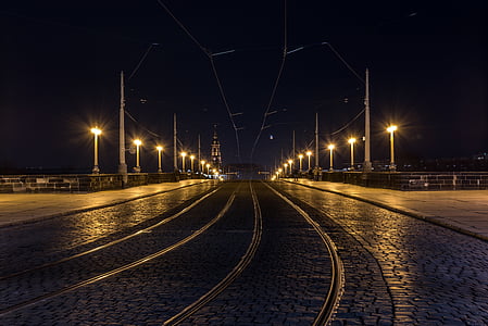 endless photography of empty road during night thumbnail