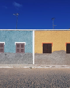 yellow painted bungalow house thumbnail
