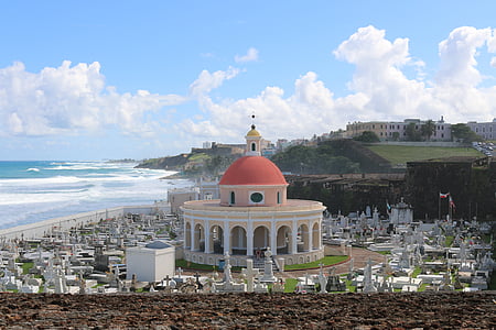 white and pink painted mosque near sea thumbnail
