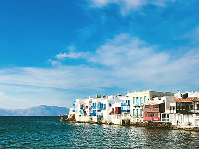 landscape photo of building beside body of water thumbnail