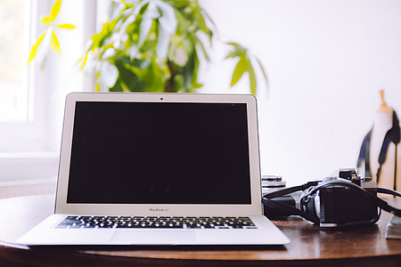 MacBook Air and vintage cameras thumbnail