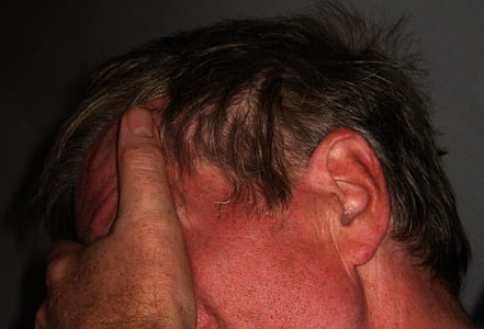 man holding his face thumbnail