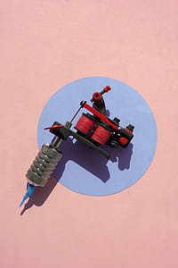 black and red brushless tattoo thumbnail