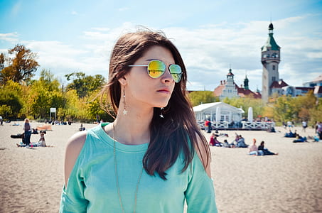 woman standing in front of tower thumbnail