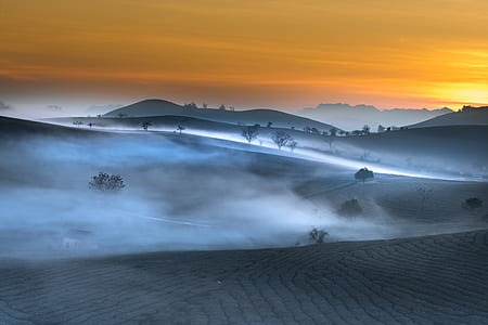 landscape photography of mountains with fog thumbnail