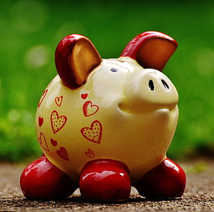 yellow and red ceramic piggy bank thumbnail