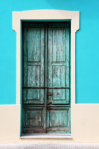 teal wooden door with white wooden frame thumbnail