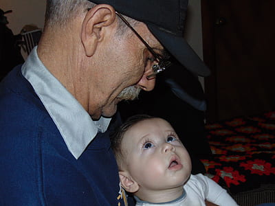man holding baby thumbnail