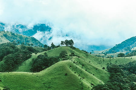 hill landscape during daytime thumbnail