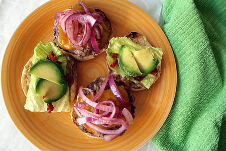 patty with vegetable on brown plate thumbnail