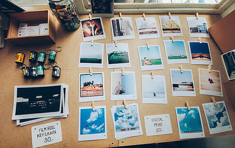 assorted photographs on table thumbnail