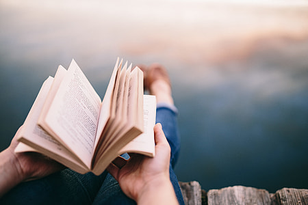 Reading book at lake thumbnail