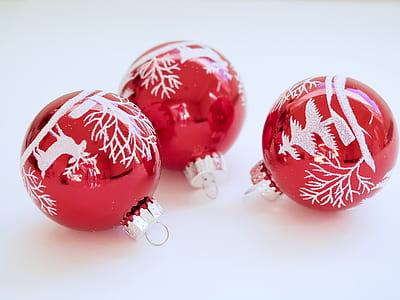 three red-and-white Christmas baubles thumbnail