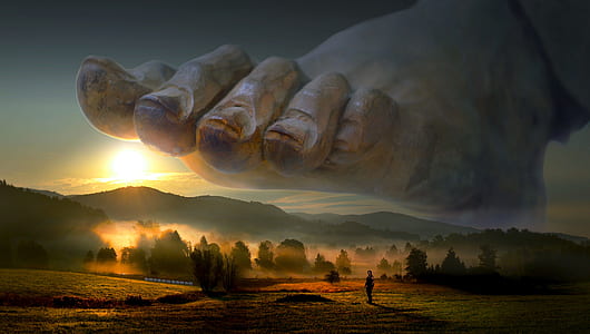 silhouette of person over giant foot digital wallpaper thumbnail