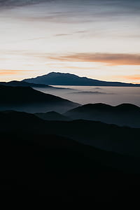 mountain near body of water thumbnail