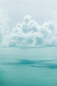 white clouds over blue ocean thumbnail