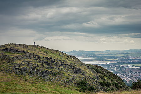 person standing on top of mountain thumbnail