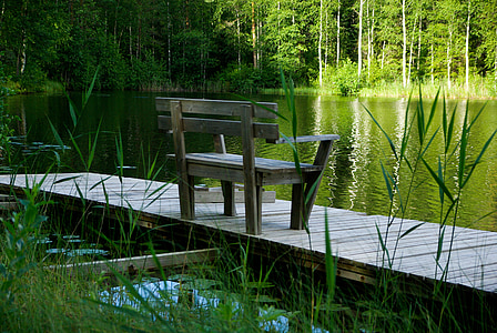 gray wooden bench photo during daytime thumbnail