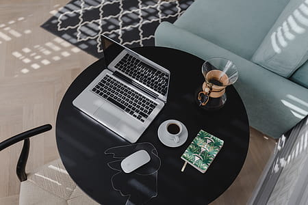 Workplace with laptop on table at home thumbnail