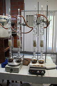 four clear glass laboratory equipments thumbnail
