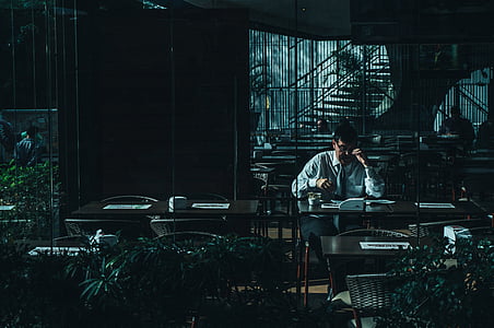 man sitting on chair thumbnail