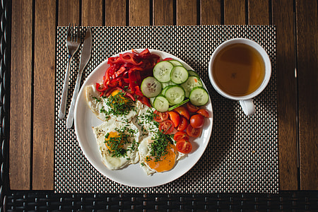 Paleo breakfast eggs with vegetables outside thumbnail