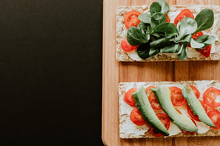 sliced tomatoes on chopping boards thumbnail