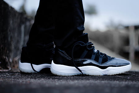 person wearing pair of Air Jordan 11's thumbnail