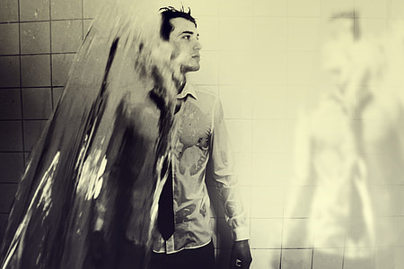man in white button-up shirt take a bath thumbnail