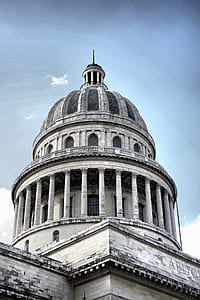 worm's eye-view photography of white concrete dome thumbnail
