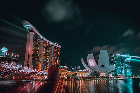 time lapse photography of city building during night time thumbnail