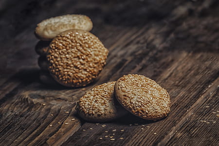 Photography of Pile of Cookies With Sesame Seeds on Table thumbnail