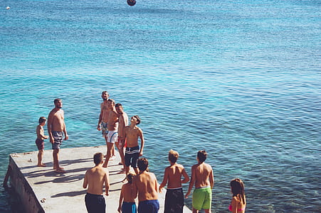 group of people standing on dock thumbnail