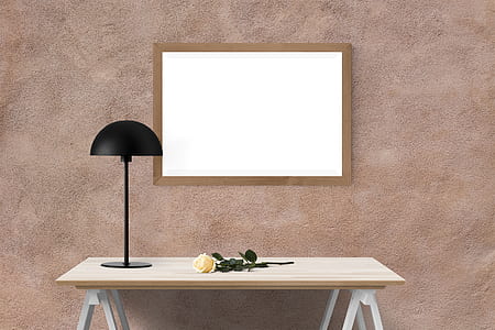 black table lamp on brown wooden table thumbnail
