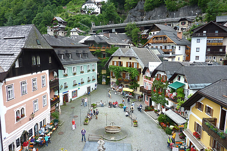 people on street surrounded with buildings at daytime thumbnail