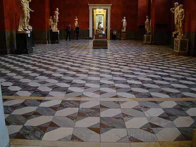museum with statue and people near door passing thumbnail