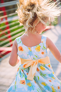girl wearing multicolored dress thumbnail