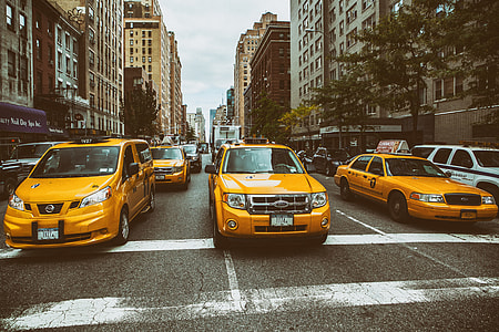 Taxis wait on the busy streets of Manhattan in New York City thumbnail