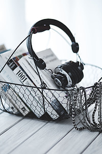 Black smartphone and headphones with various items thumbnail
