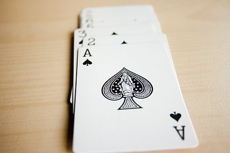 selective focus photography of playing cards thumbnail