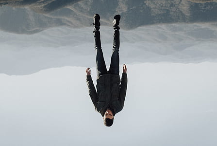 man on black mountains thumbnail