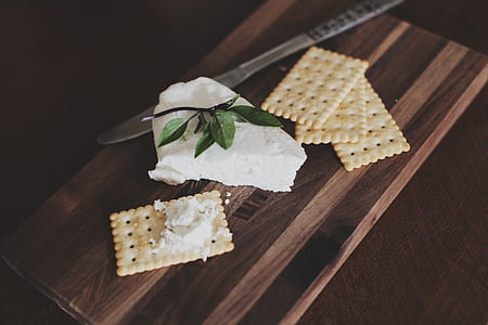 closeup photo of biscuits and cheese on brown panel thumbnail